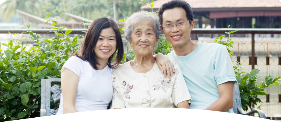 old lady with her caregivers