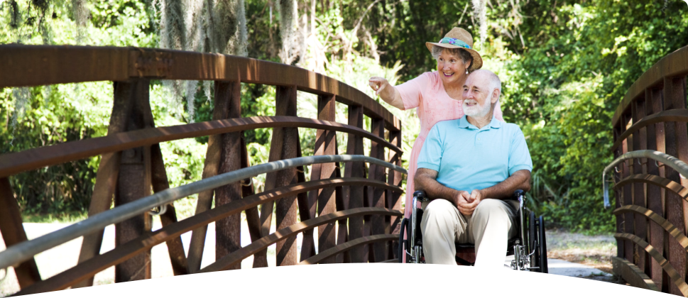 happy old couple in the park