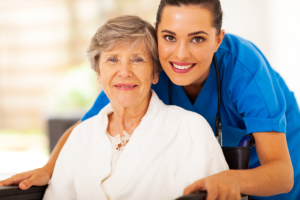 young doctor with elderly patient at the nursing home